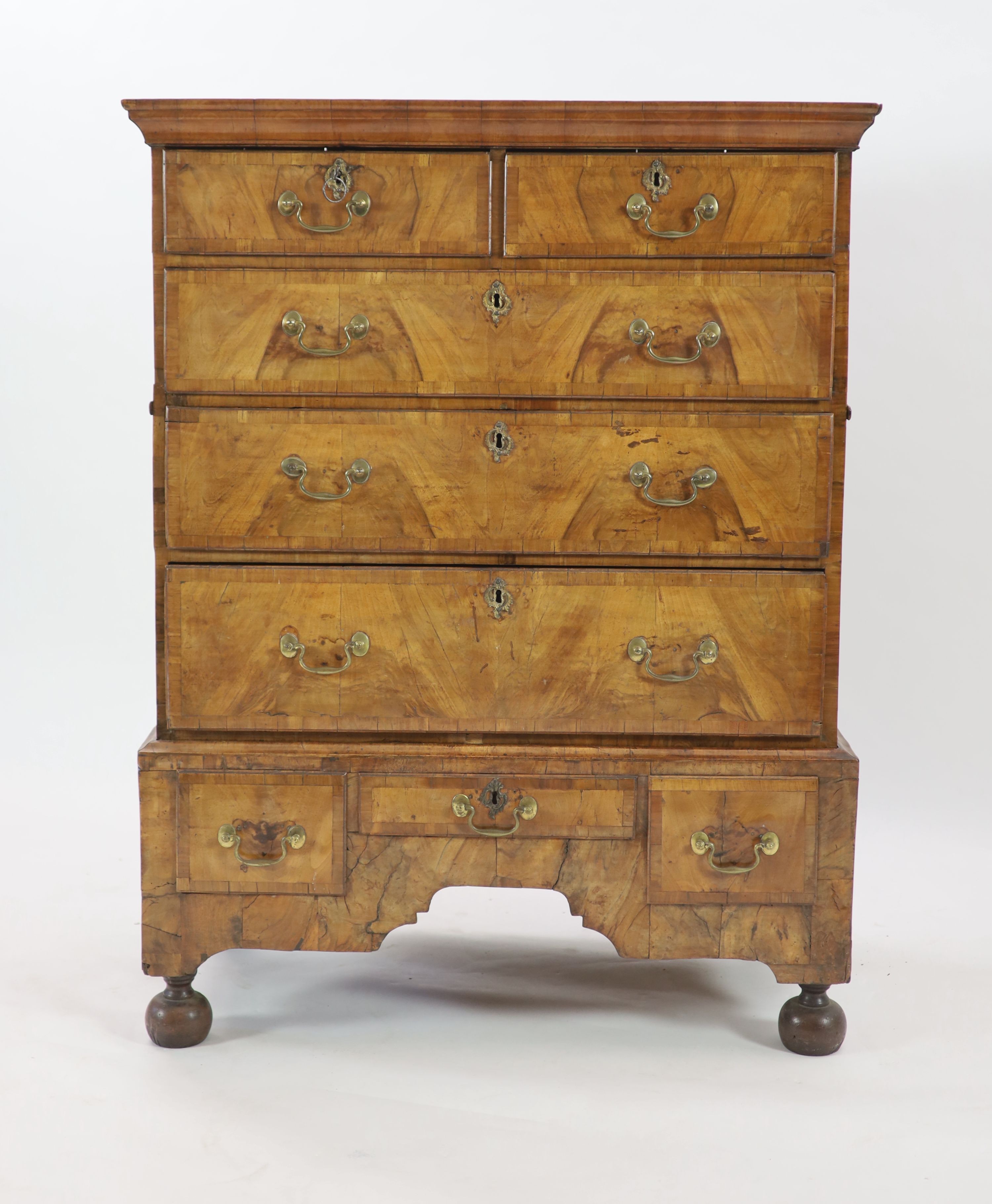 A George II walnut chest on stand W.102cm D.51cm H.132cm